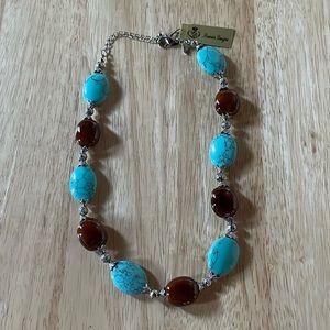 Vintage Never worn 18”necklace with beautiful glass beads. Turquoise & brown